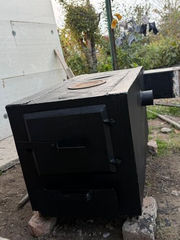 ключ набор инструментов: Металлическая твердотопливная печь-камин с варочной поверхностью