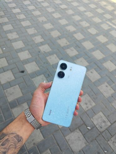 vinil telefon ucun: Xiaomi Redmi 13C, 256 ГБ, цвет - Голубой, 
 Кнопочный, Отпечаток пальца