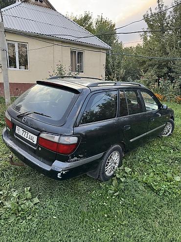 2 4 д: Mazda 626: 1999 г., 2 л, Механика, Бензин, Универсал — 6