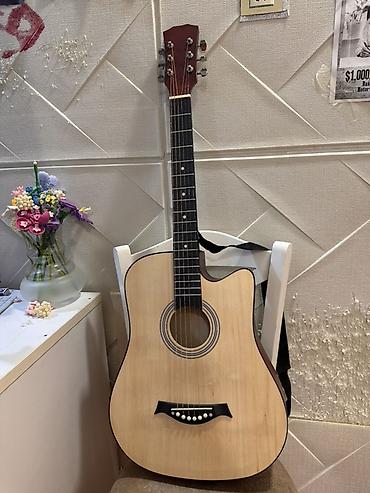 gitara: Akustik gitar – dreadnought korpus, cutaway (kalka) dizaynı - Korpus — 2