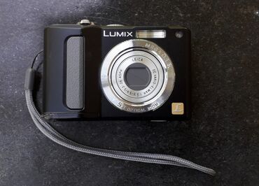 фото объектив: Panasonic DMC-LZ8, объектив Leica, работает от 2-х пальчиковых