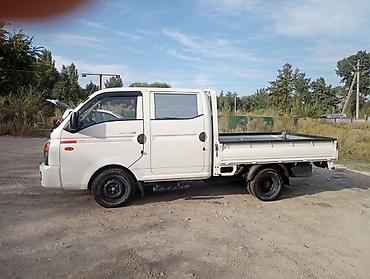электро микроавтобус: Hyundai Porter II (двухрядная кабина, бортовой)2018г. - Компактный — 2