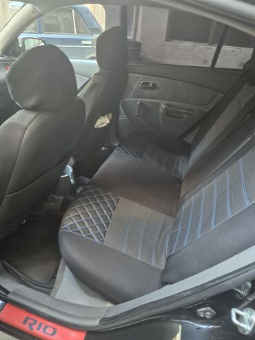 Kia: Kia Rio: 1.4 l | 2009 il Sedan — 10