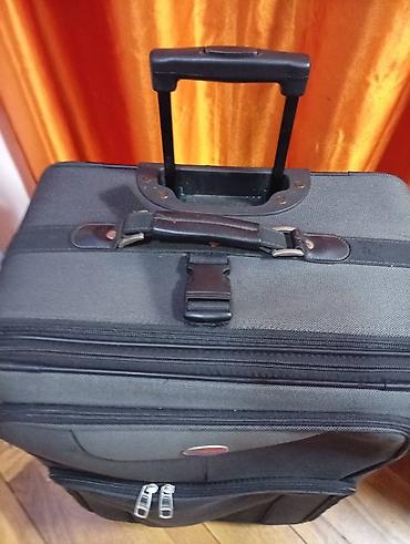 Putni koferi i torbe: Veliki kofer na točkiće – American Tourister. 75 45 30 - — 5