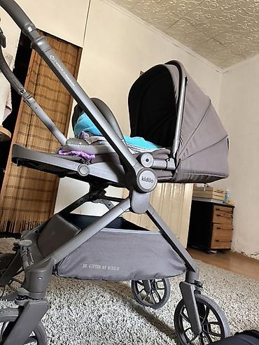 foo foo: Детская коляска Kidilo (серия RS/Z-Travel, надписи на раме и корзине — 1