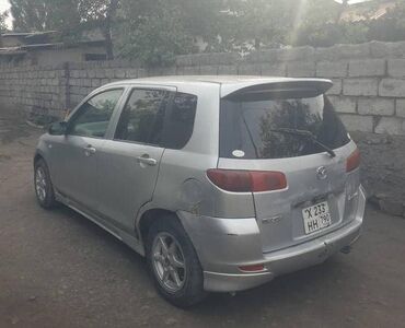 замок для спринтер: Mazda Demio: 2003 г., Хэтчбэк