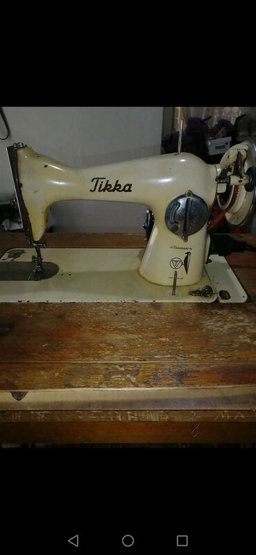 тигучу машинка: Швейная машина Tina