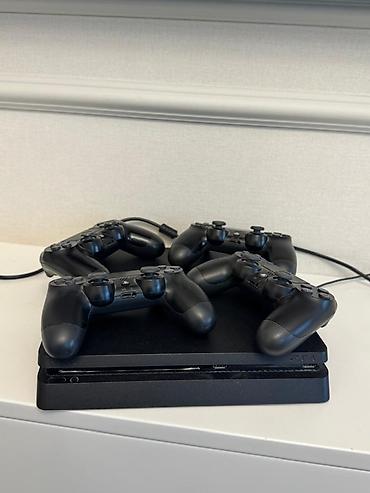 3 oyun wwe 2022, FC25,gta5,PlayStation 4 Slim konsolu + 4 ədəd