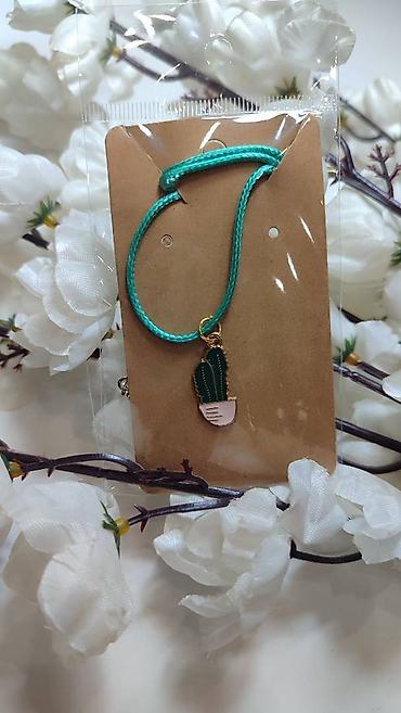 guess torbe outlet: - Dekorativna ogrlica od tirkizno-zelene pletene vrpce - Metalni — 1