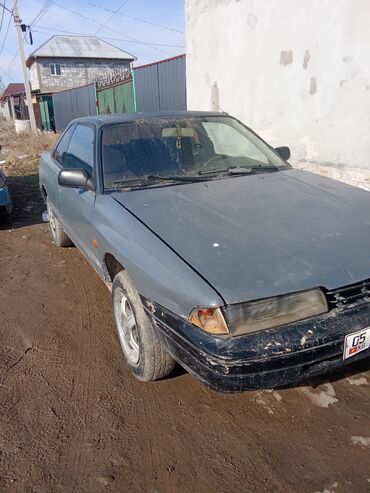 Mazda: Mazda 2: 1990 г., 2.2 л, Механика, Бензин, Седан