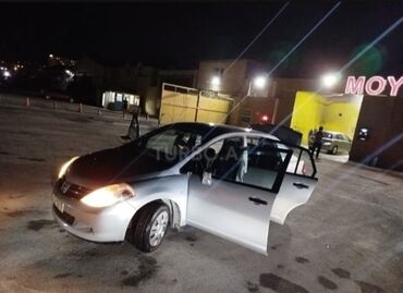 авто купить бу: Gümüşü rəngli Nissan Tiida avtomobili təklif olunur. Bu sedan növlü
