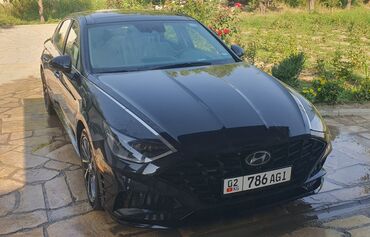 шины на соната: Черный седан Hyundai Sonata с элегантным современным дизайном