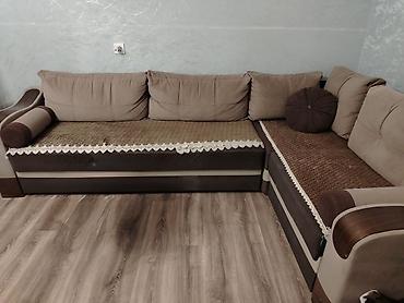 Künc divanı – iki hissəli, L formalı model. Rəng palitrası: qəhvəyi və lalafo.az -da Künc divanı – iki hissəli, L formalı model. Rəng palitrası: qəhvəyi və