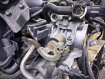 devo tiko: Дроссельная заслонка Mazda 2004 г., Б/у, Оригинал, Япония — 1