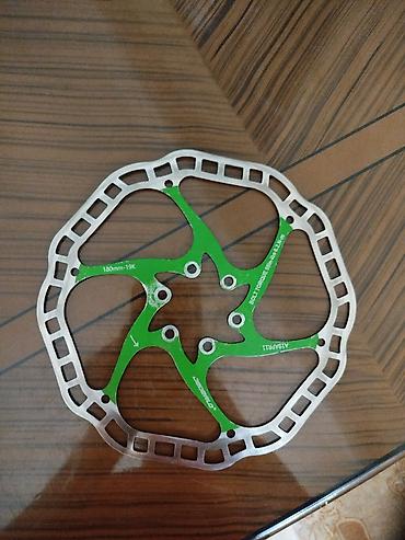 balta disk: Velosiped üçün disk əyləc rotoru 180 mm. Rotorun üzərində — 1