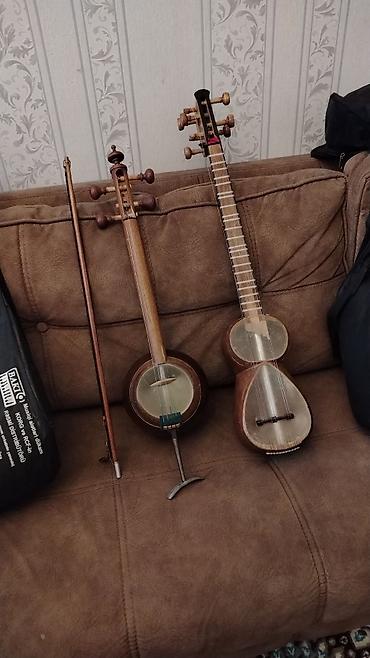gitara tarnada: Məhsul: Azərbaycan milli musiqi alətləri dəsti Təsvir: - 1 ədəd — 1