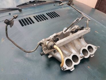 Auto delovi: Usisna grana sa diznama Lada 21214 Niva br.2. Polovno, očuvano — 2