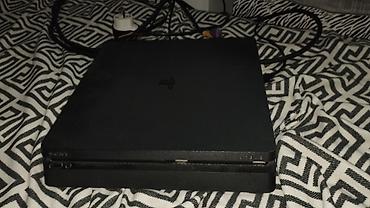 sli: Игровая консоль Sony PlayStation 4 Slim (чёрная) в комплекте. Состав — 1