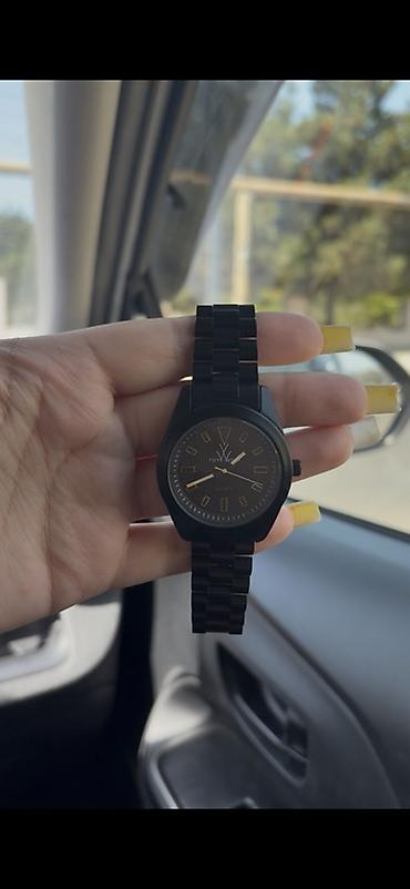 mercedes saat: Qara rəngdə minimalist analoq qol saatı. - Korpus: mat qara tonlarda — 1