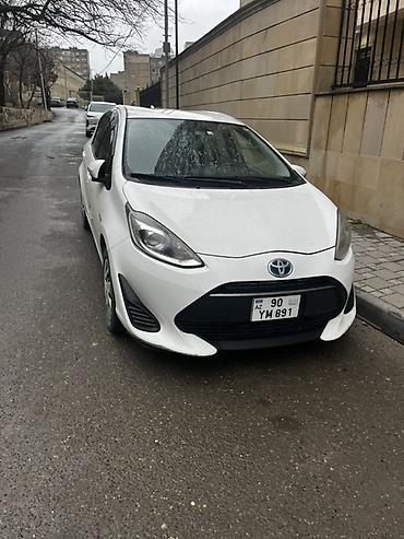 Toyota Prius c (Aqua) — ağ rəngli, şəhər üçün ideal hibrid hetçbek lalafo.az -da Toyota Prius c (Aqua) — ağ rəngli, şəhər üçün ideal hibrid hetçbek