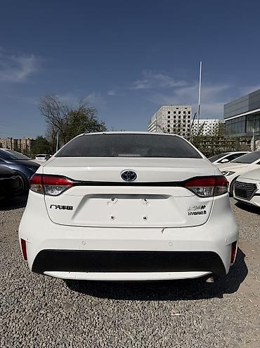 corolla 2016: Toyota Corolla: 2022 г., 1.8 л, Автомат, Гибрид, Седан — 7