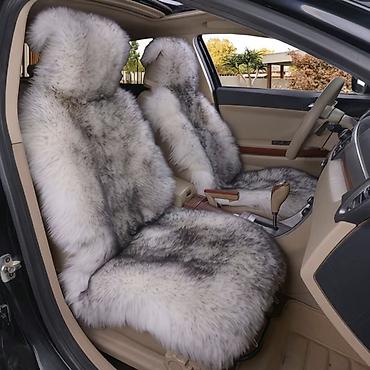 Меховая накидка на сидение.Раскошн,выглядит богатоприятно.н ощупь