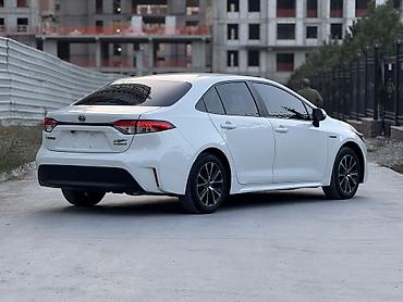 100: Toyota Corolla: 2023 г., 1.8 л, Автомат, Гибрид, Седан — 6