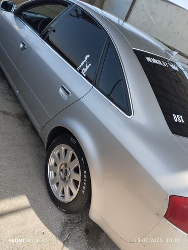Audi A6: 2.4 л | 1999 г. Седан