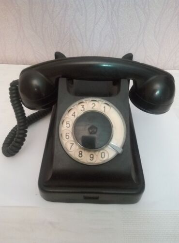 Печки, обогреватели: Disklə işləyən qədimi telefonların təmiri. Telefonun işləməyən