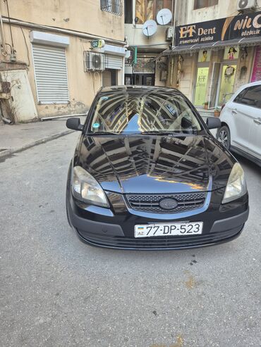 Kia: Kia Rio: 1.4 l | 2009 il Sedan — 19