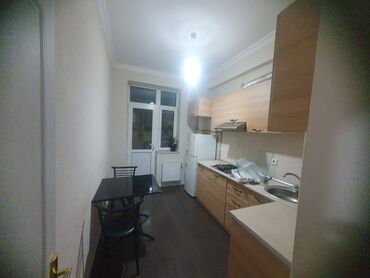 Uzunmüddətli kirayə mənzillər: Yasamal Midada Yeni tikilmiş 9 mərtəbəli binanın 1-ci mərtəbəsində 2 — 7