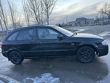 Mazda: Mazda 323: 2000 г., 1.8 л, Механика, Бензин, Универсал — 7