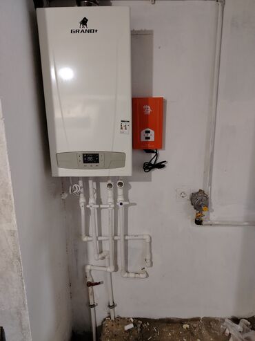 kombi və radiator: Kombilerin qurasdirilmasi montaji Radiatorlarin montaji ve cekilsi
