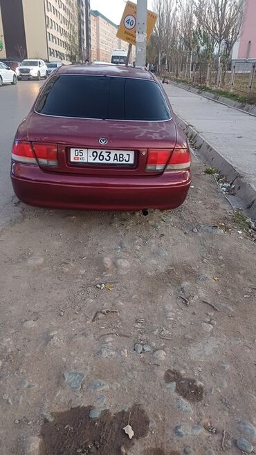 меняю дом на машину: Mazda 626: 1992 г., 2 л, Механика, Бензин, Седан