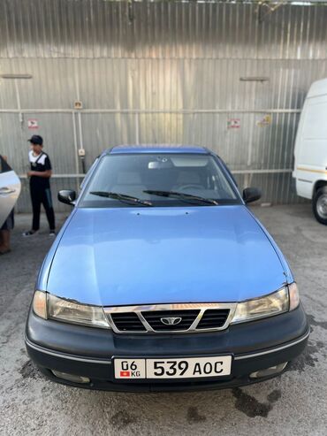 лобовой стекло нексия 2: Автомобиль Daewoo Nexia синего цвета с кузовом седан. Модель оснащена