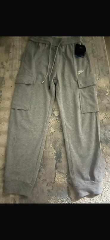 Мужские брюки, L, Nike, Новый, цвет - Серый, Самовывоз, Платная доставка at lalafo.kg Мужские брюки, L, Nike, Новый, цвет - Серый, Самовывоз, Платная доставка