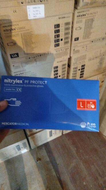 Нитриловые перчатки: Нитриловые одноразовые перчатки, голубые Особенности: - Материал — 13