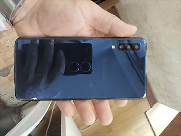 idmana aid sekiller cəkmək: Samsung Galaxy A7 2018, rəng - Göy, Barmaq izi — 2