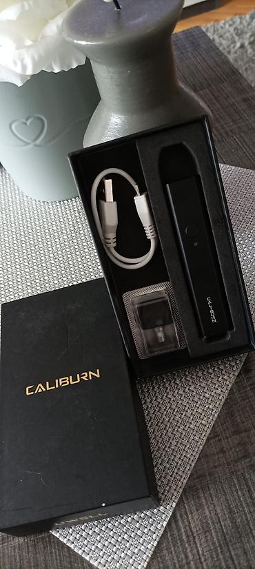 sat rokex: Uwell Caliburn pod sistem – komplet - Originalno pakovanje „CALIBURN“ — 1