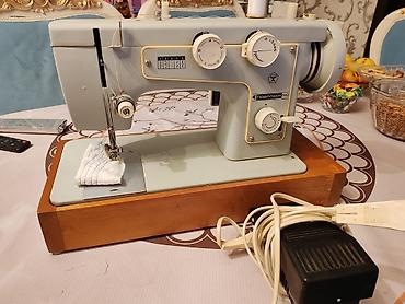 Podolsk 142 tikiş maşını - Elektriklə işləyən, pedal idarəetməli model