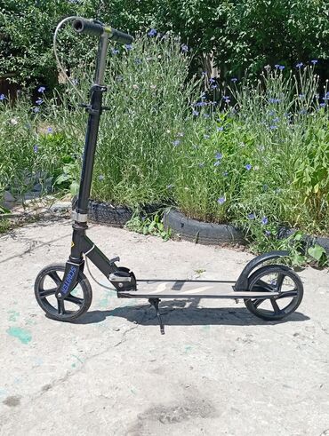 продаю мото: Складной самокат с регулируемой по высоте рулевой стойкой. Рама