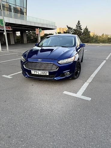 Транспорт: Ford Fusion sedan – mavi rəng, 4 qapı, ön və arxa park yerlərində — 3