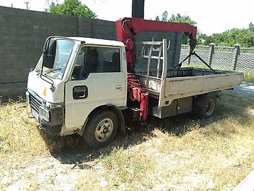 кран камаз: Манипулятор, Nissan, 1986 г., от 4 т — 1