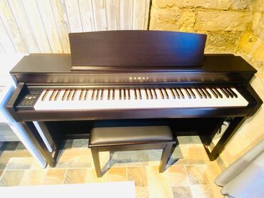 Pianolar: Premium sinfə məxsus məşhur yapon brendi kawai. Möhtəşəm səslənməyə