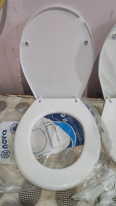 rakuska: Продаю комплект из 2 белых пластиковых сидений с крышками для унитаза — 3
