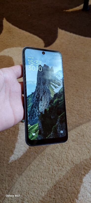 сотовый телефон fly ff247: Redmi 12, 128 ГБ, цвет - Синий, Сенсорный, Отпечаток пальца, Две SIM карты