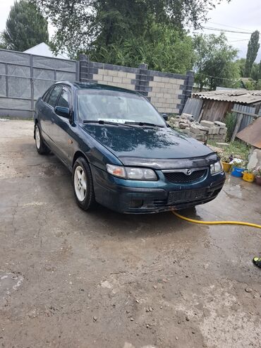 зарядное устройство для электромобиля: Mazda 626: 1999 г., 2 л, Автоматические, Бензин, Хэтчбэк
