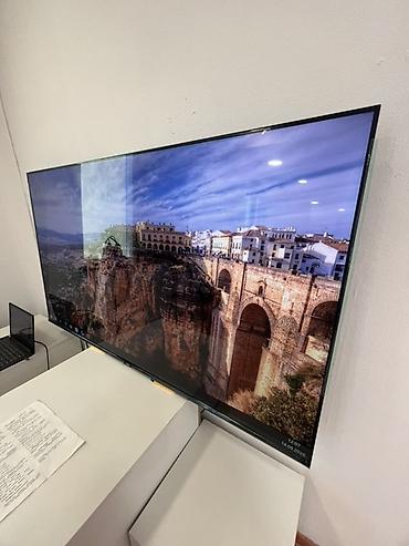 4k: Большой Smart‑телевизор с тонкими рамками в идеальном состоянии - — 2