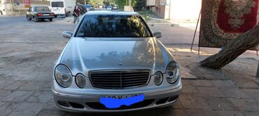 ГАЗ: Mercedes-Benz E‑Class (W211) sedan – gümüşü rəng. Əsas xüsusiyyətlər