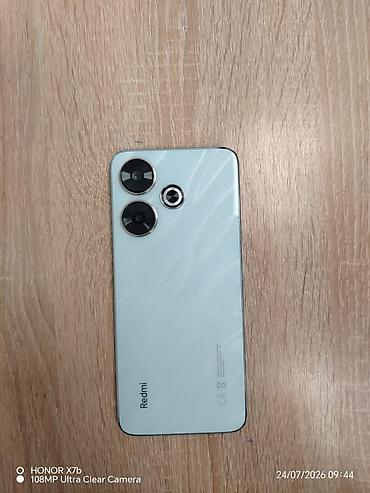 Redmi 13. - Rəng: açıq mavi (mat şüşə arxa panel), düz kənarlı gövdə